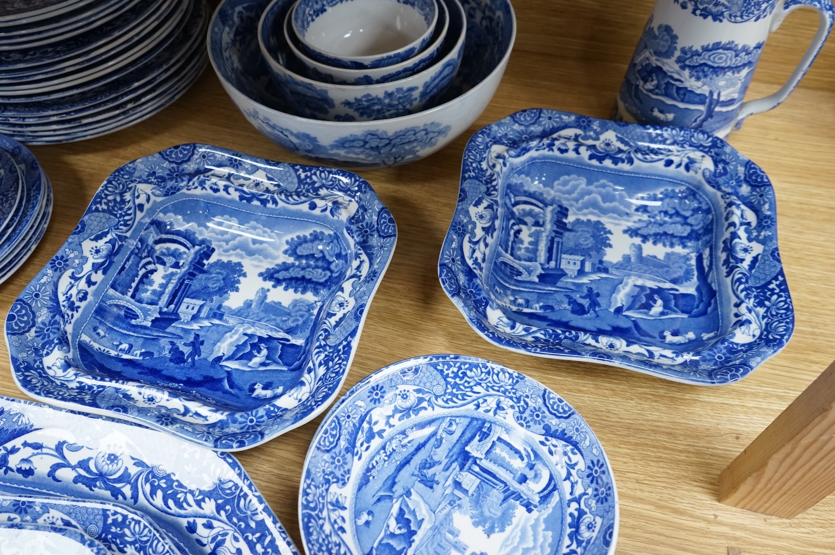 A Spode blue and white Italian service to include dinner plates, graduated bowls and platters, largest 37cm wide